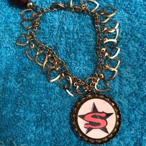 Beautiful vintage bracelet w/ gold hearts Superman